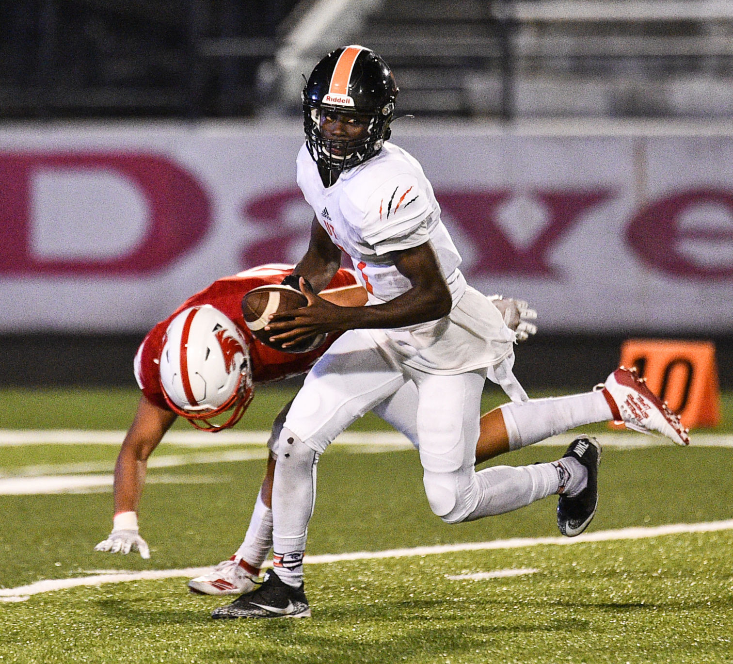 083019-qct-spt-ut-west-football-021a.jpg